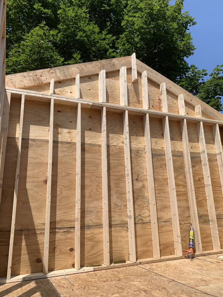 New gable wall framed and sheathed