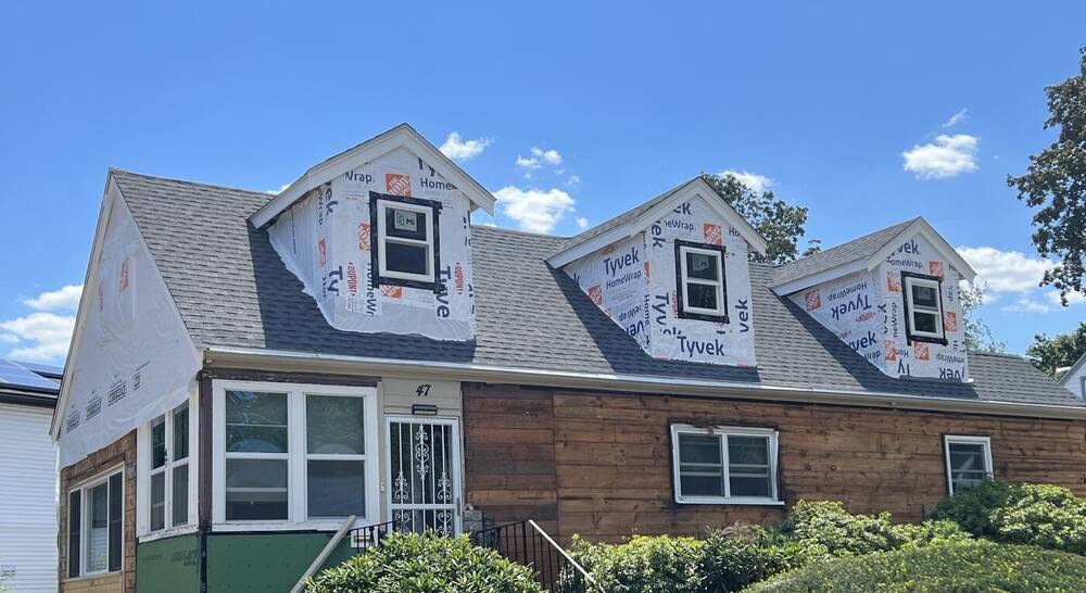 Three new dormers wrapped in housewrap