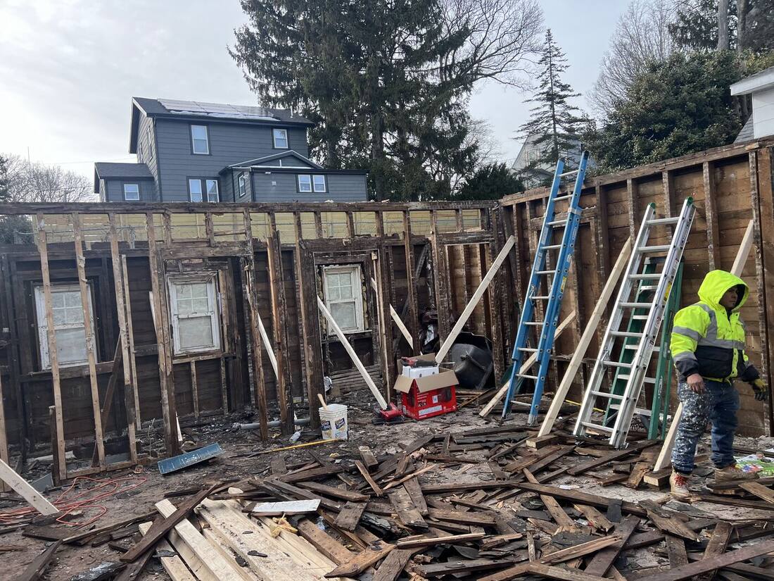 Original exterior walls stripped down to the framing