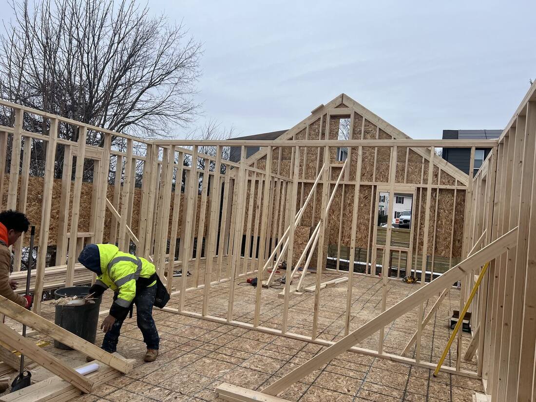 Crew framing the new second-floor walls