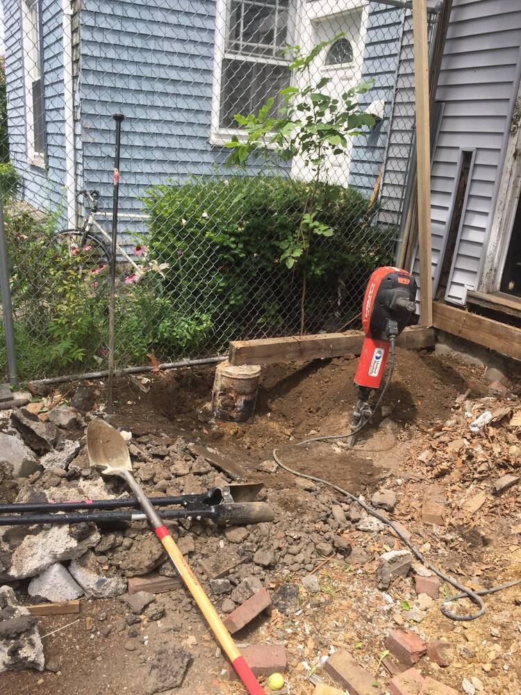 Jackhammer and tools at the old porch footing excavation
