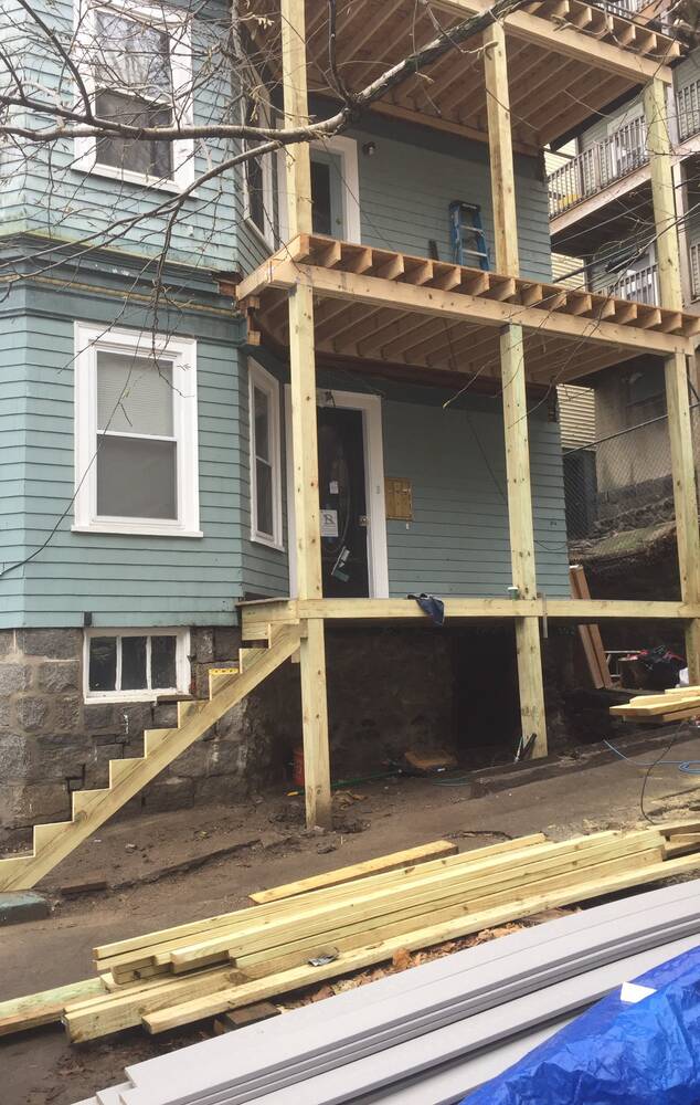 Porch framing complete with the new stair stringers in place