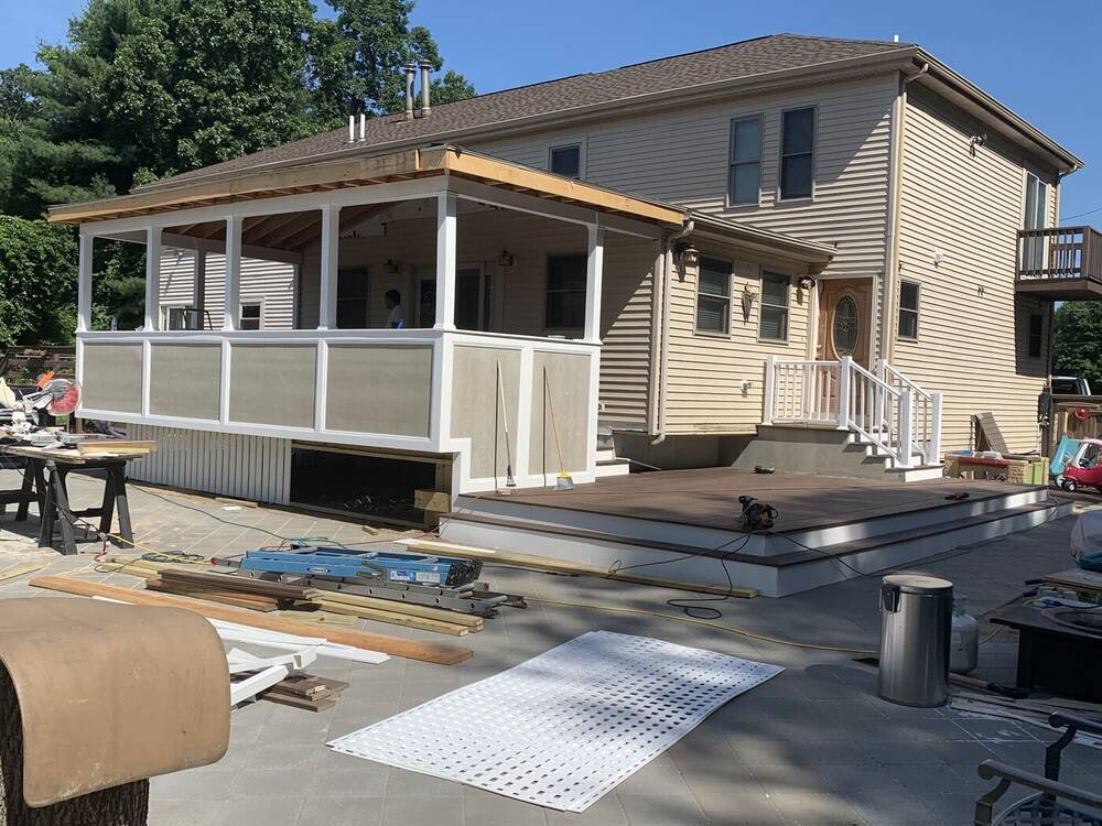 Finished screened covered porch and wraparound composite deck