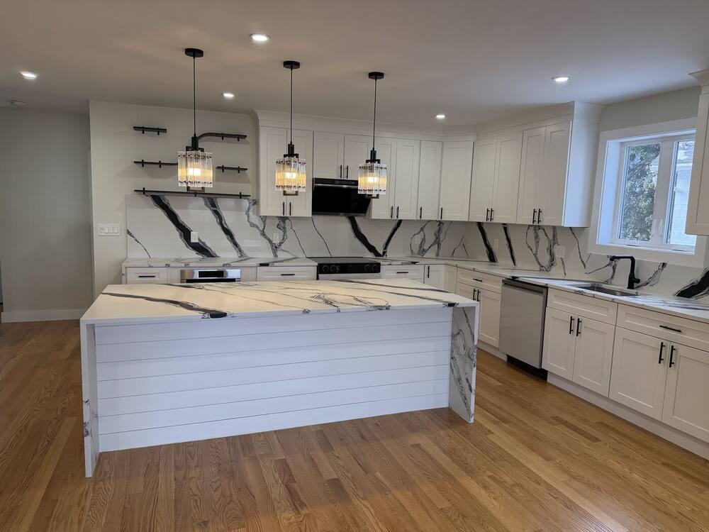 Full view of the kitchen with shiplap island and open shelving